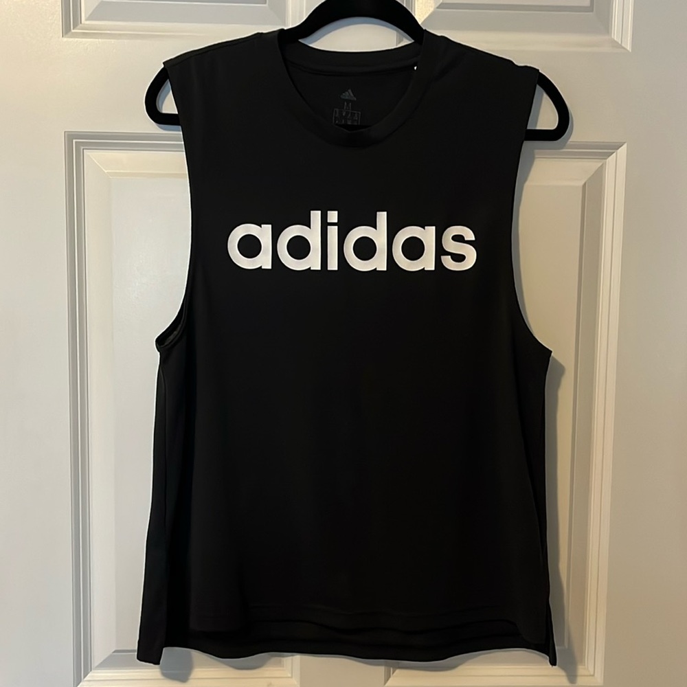 Adidas women’s medium muscle tank top. Black and white like new